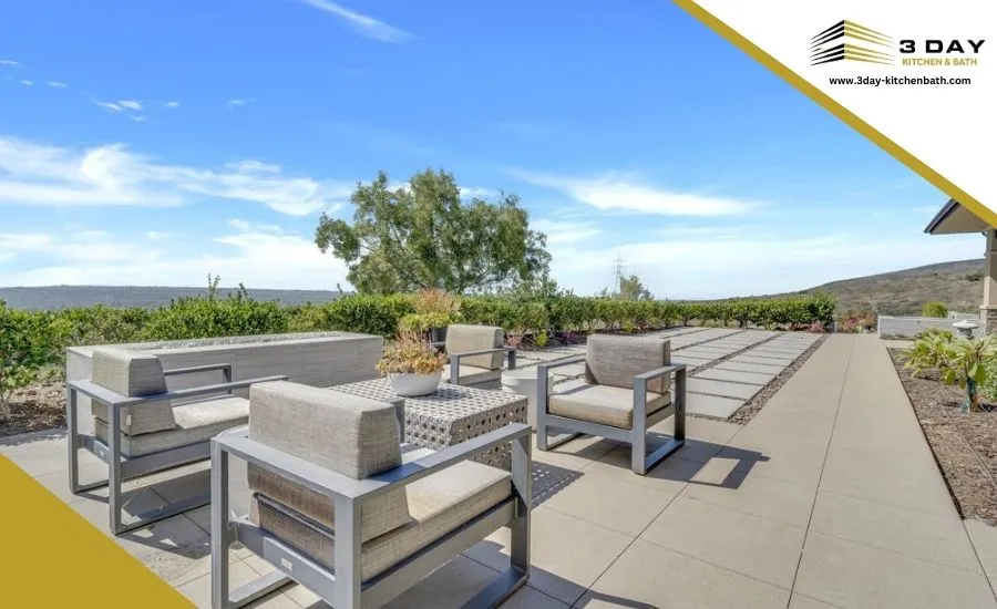 Backyard remodel with patio seating and hillside view