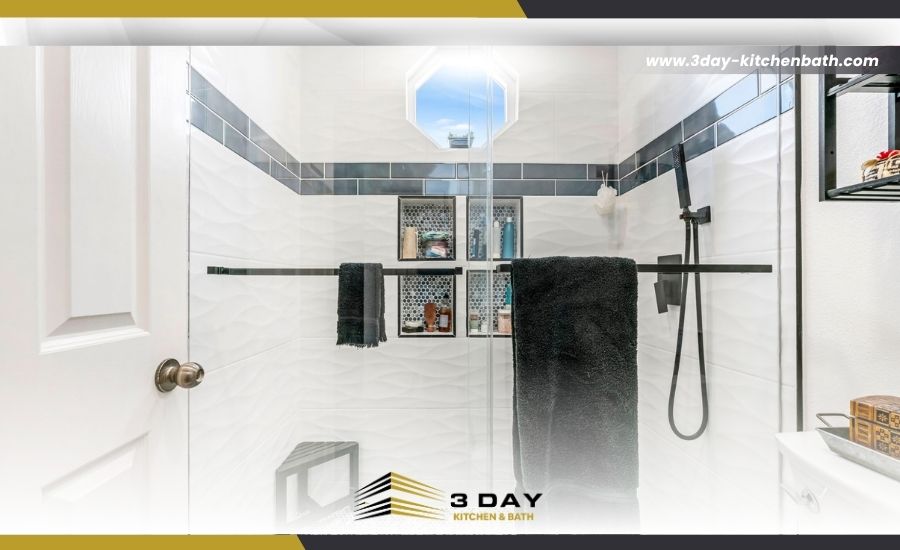 Modern walk-in shower remodel with white textured tiles, black fixtures, and the 3 Day Kitchen & Bath logo.